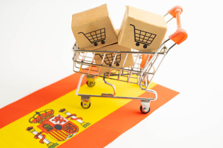 Online shopping, Shopping cart box on Spain flag, import export, finance commerce.の写真素材