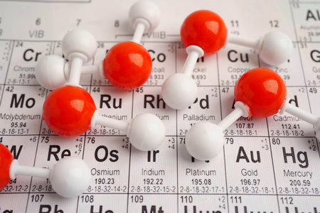 Molecules chemical on a periodic table background.の写真素材