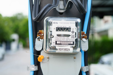 Bangkok, Thailand April 7, 2025 Electric measuring power meter for energy cost at home and office.