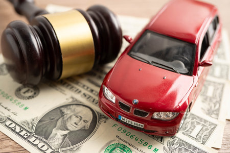 Bangkok, Thailand November 18, 2023 Car on banknote money, buying or insurance concept.のeditorial素材