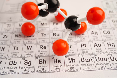 Molecules chemical on a periodic table background.の写真素材