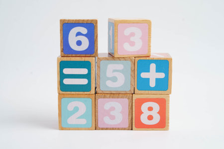 Number wood block cubes for learning Mathematic, education math concept.