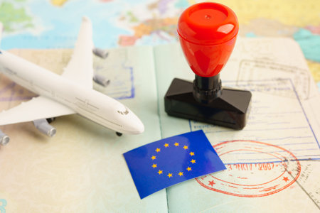 EU passport with approved stamp on document for tourism to immigration at airport in country.