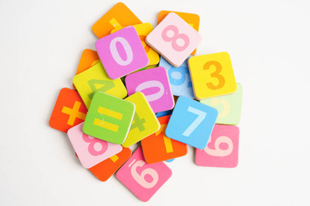 Number wood block cubes for learning Mathematic, education math concept.
