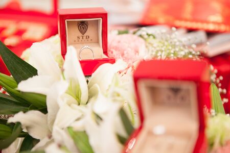 Wedding rings in wedding ceremony,Thai wedding rings in an open box on traditional Thai style...