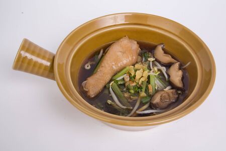 Braised chicken noodle soup Thai style.の写真素材