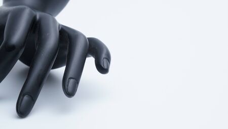 Black mannequin hands on the white background.の写真素材
