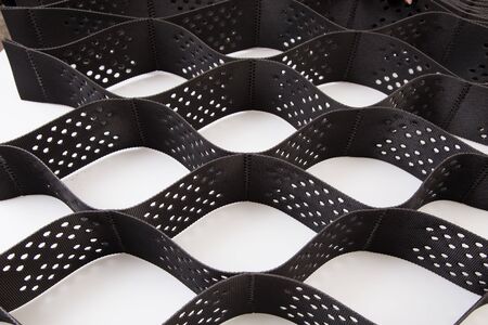 The design of the slope. Plastic black honeycomb frame filledの写真素材