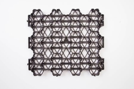 The design of the slope. Plastic black honeycomb frame filled