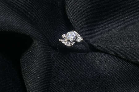 Jewellery diamond ring on a black background