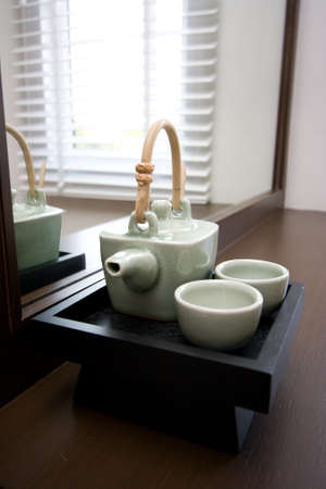 Green japanese tea on stone table.の写真素材