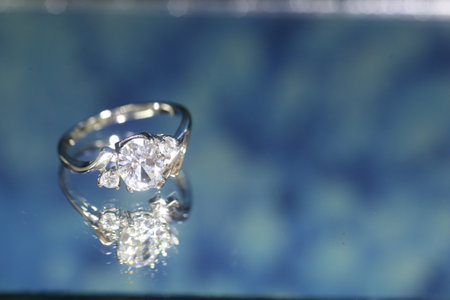 Diamond ring on dark blue background,wedding ring, engagement ring