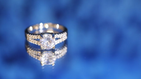 diamond  ring on blue  backgroundの写真素材