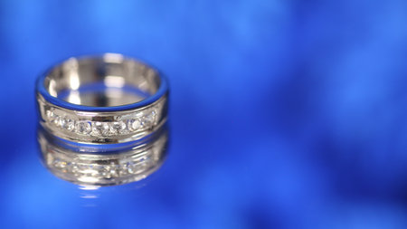 diamond  ring on blue  backgroundの写真素材