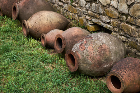 Old traditional clay wine barrels in Geordian monasteryの写真素材