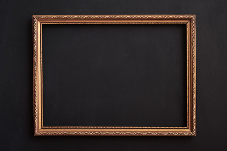 Horizontal gold frame on black for copyspace
