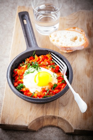 Traditional middle eastern dish of shakshuka in a pan.の写真素材