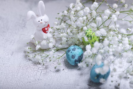 Easter symbols including flowers eggs and bunnyの写真素材