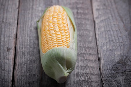 Corn on woodの写真素材