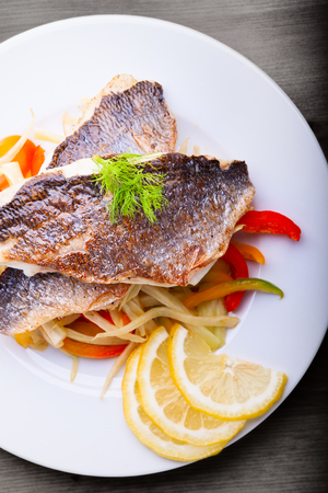 Fillet of sea bream with fennel and pepperの写真素材