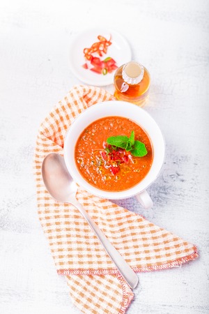 Bowl of fresh tomato soup gazpachoの写真素材