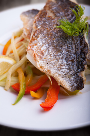 Fillet of sea bream with fennel and pepperの写真素材