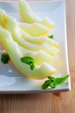 Honeydew melon slicesの写真素材