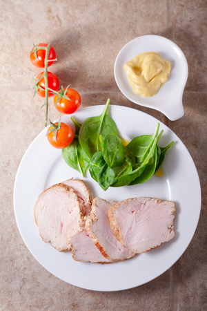 Turkey breast with green saladの写真素材