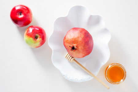 Apples, pomegranate and honey for Rosh Hashanahの写真素材
