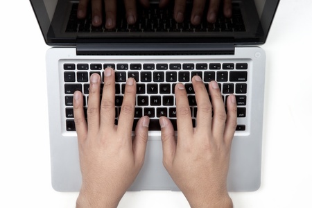 Man hands typing on Notebook keyboard