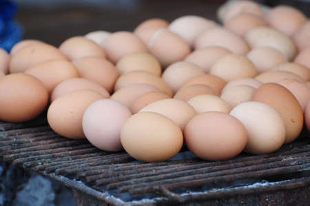 eggs grill at market, thailandの写真素材
