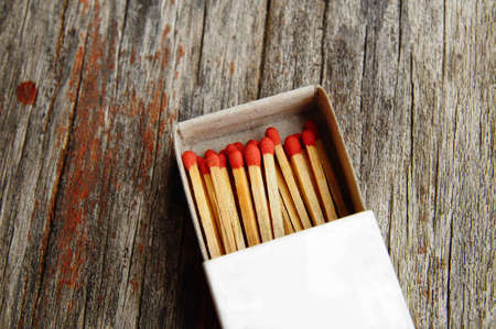 Group of matches on wooden textureの写真素材