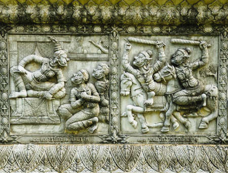 ramayana statue on wall of fence at Wat Panan Choeng temple in Ayutthaya Thailand