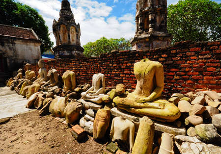 ruins buddha statue at wat mahathat temple, sankhaburi, Chai nat in thailandの写真素材