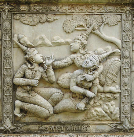 ramayana statue on wall of fence at Wat Panan Choeng temple in Ayutthaya Thailandの写真素材