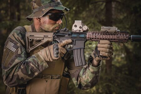 special forces soldier aiming