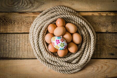 easter eggs wrapped with ropeの写真素材