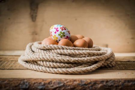 easter eggs wrapped with ropeの写真素材