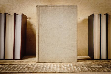 view of the cover of the book on a wooden shelfの写真素材