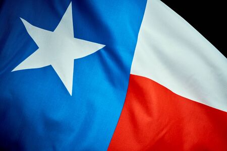 Texas flag waving in the wind on the Independence Day in Americaの写真素材