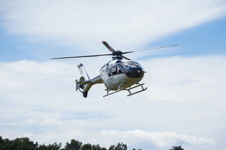 passenger helicopter flies at an air showの写真素材
