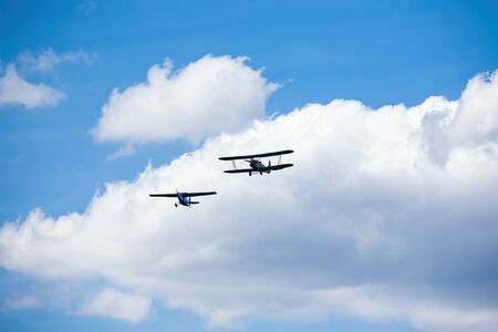 old military aircraft fly at air showの写真素材