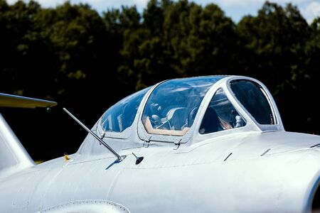cockpit of an old silver Russian fighter jetの写真素材