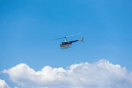 passenger helicopter flies at an air showの写真素材