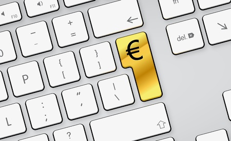 golden glossy euro button on white keyboardの写真素材