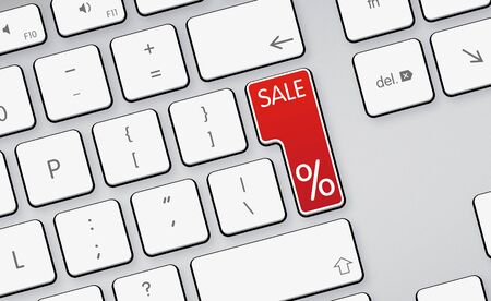 Red sale button on white keyboardの写真素材