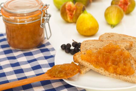 Breakfast with fig jam, bread and fresh delicious figsの写真素材