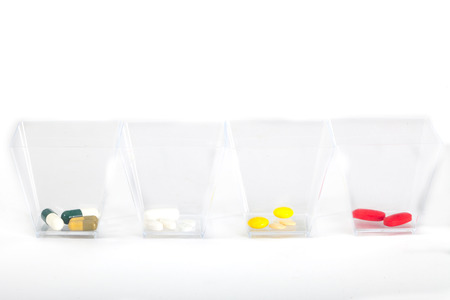 Drugs doses in glasses. Therapy or remedy for healthの写真素材