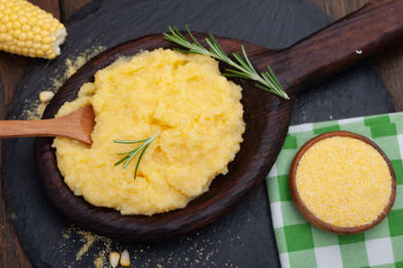 Mamaliga or polenta porridge made out of yellow maize flour. Homemade palenta with cheese, traditional meal on Balkan.の写真素材