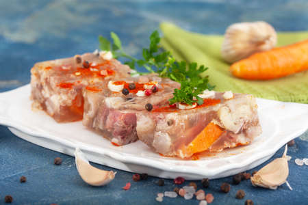 Pihtije - serbian traditional dish - aspic with pork meat and vegetables. Meat jelly - holodets, pihtija or galareta.の写真素材